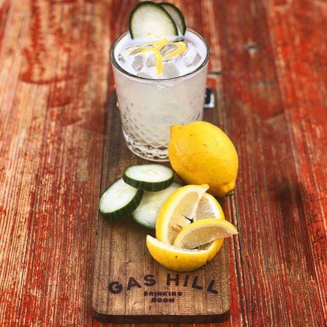 Cocktail with lemons and cucumber